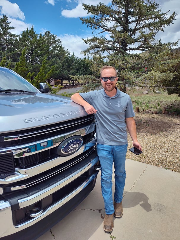 Kyle and Jeremey In Front of a Custom Home Being Built