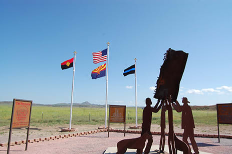Chino Valley Memorial under clear blue skies with the flags flying at full staff. Honoring fallen heroes in yavapai county, AZ