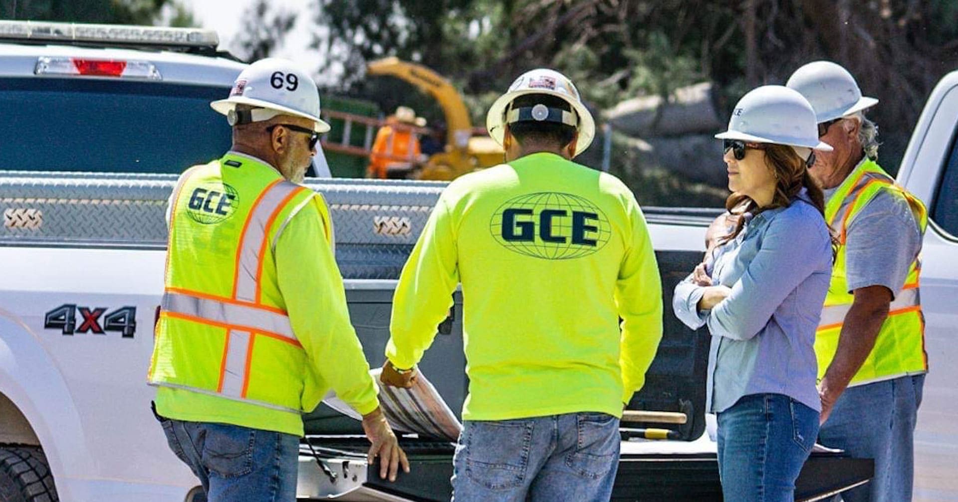 GCE engineers in the field evaluating a project