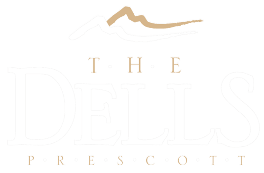 The Dells Custom Homes Logo