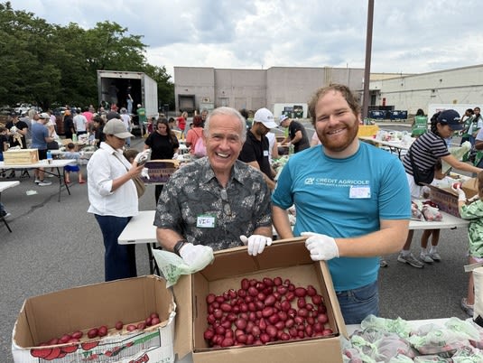 Vic and his son Clayton volunteering for Grassroots Grocery in the Bronx