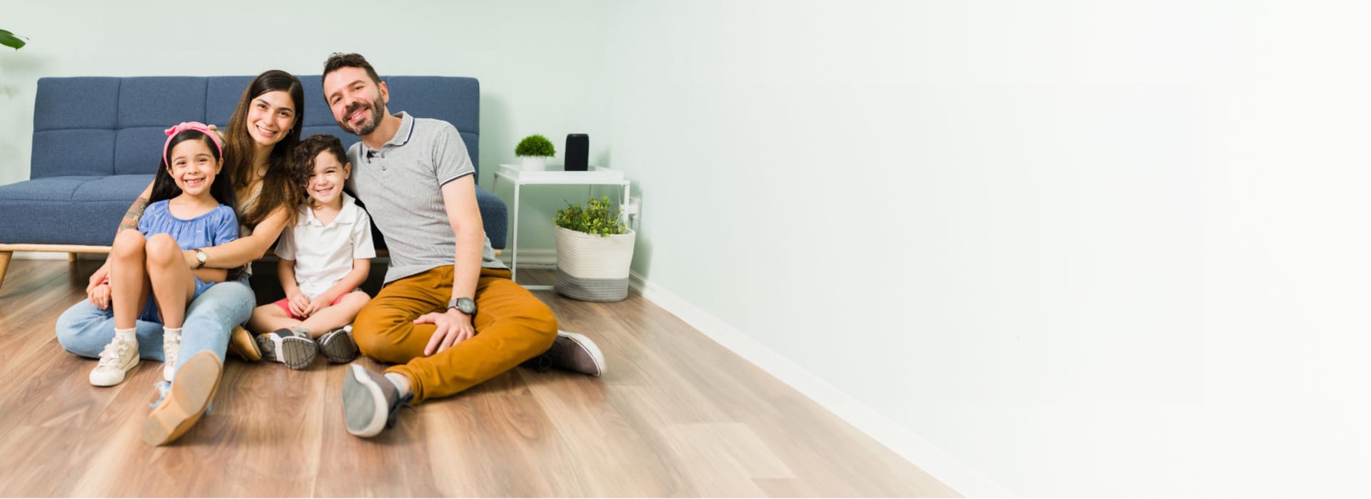 A fmaily enjoying the clean comfortable air in their living room.