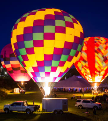 Balloons at the annual Colorfest Hot Air Balloon Rally glow